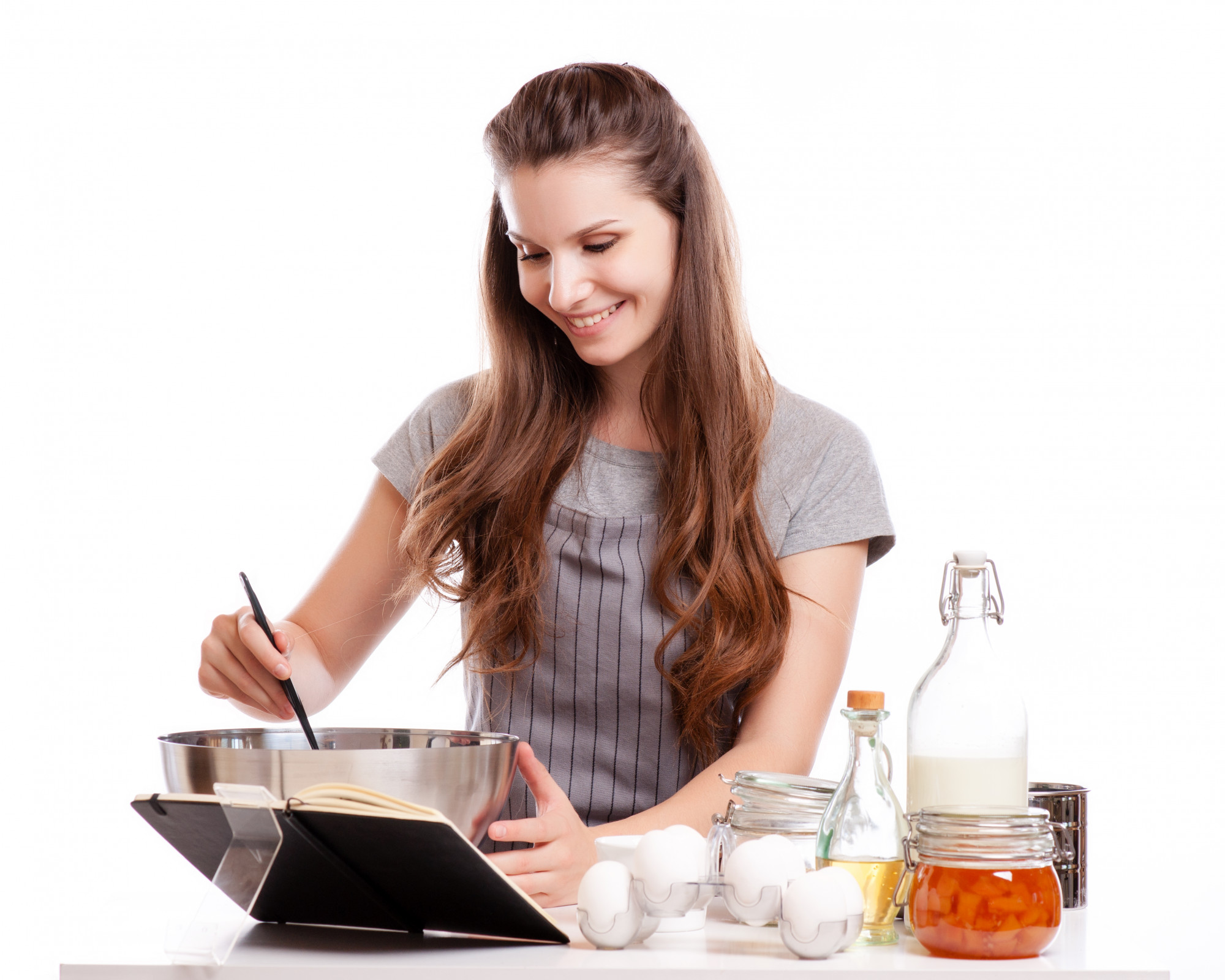 Student cooking in a small kitchen class